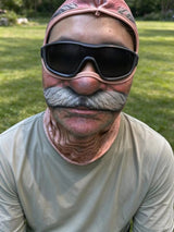 Customer wearing an old-man mask
