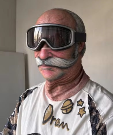 Customer wearing an old-man printed balaclava